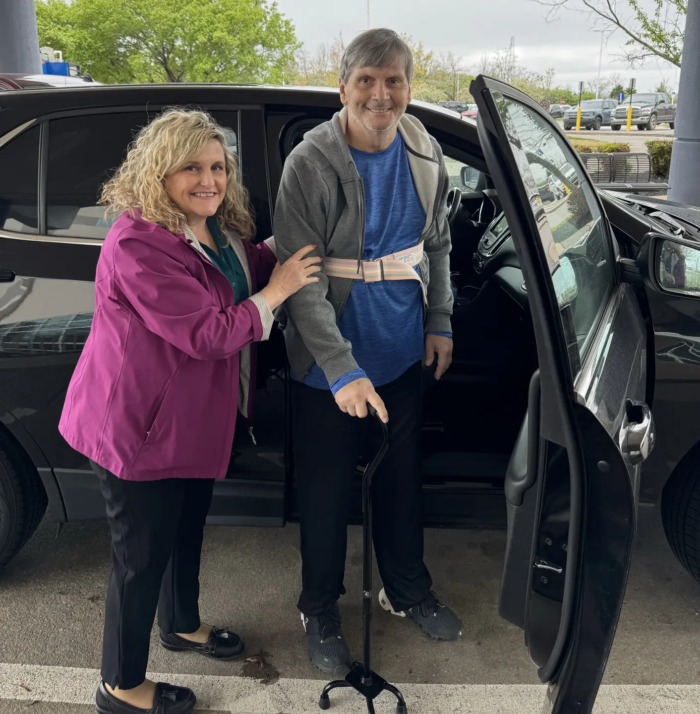 Trent Snead and wife, Renee, getting into their car to return home from hospital.