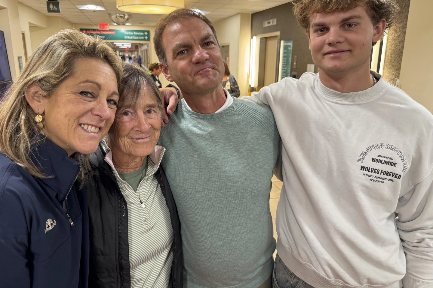 Erin Grimm with her mother,husband and son.