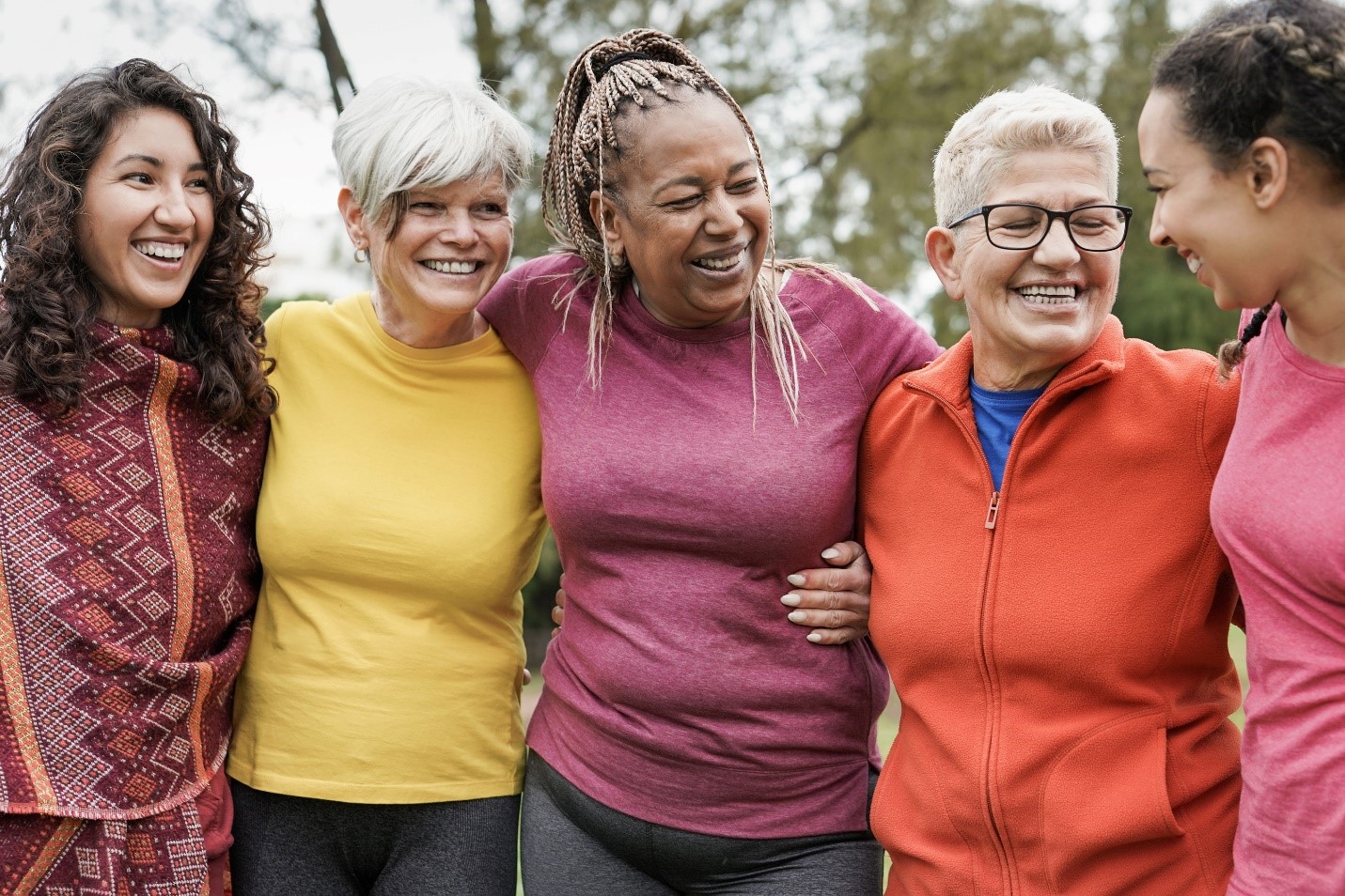 A group of senior women in happy conversation.