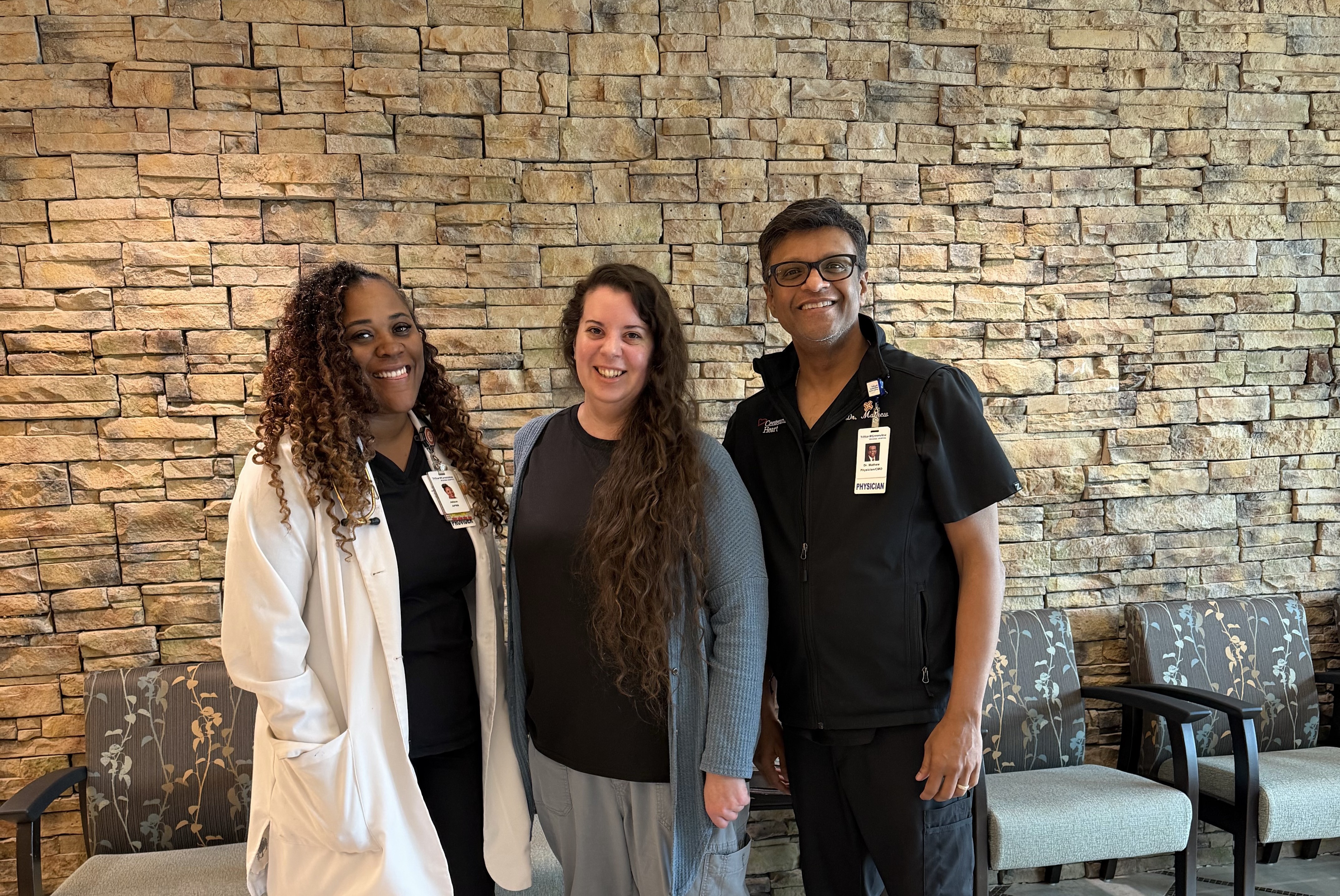 Samantha with Jataun her APRN and Dr. Mathew.