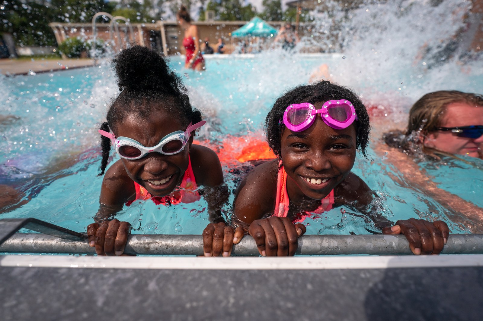 Kids swimming in a pool
