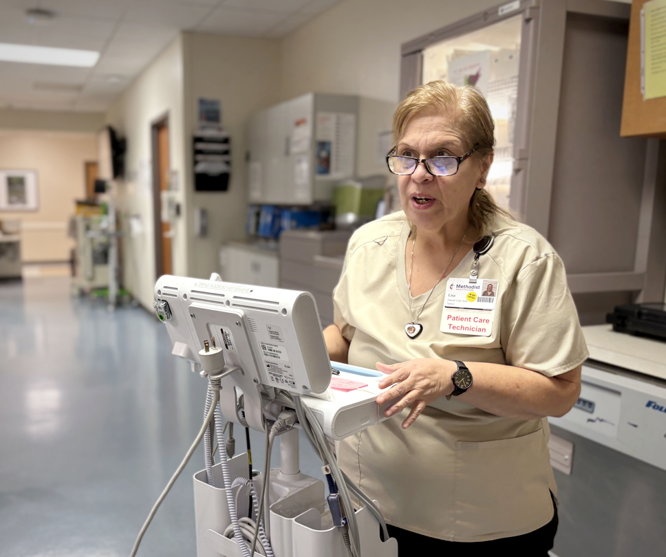 Lisa Rodriguez at work in the hallways at Methodist Hospital Texsan