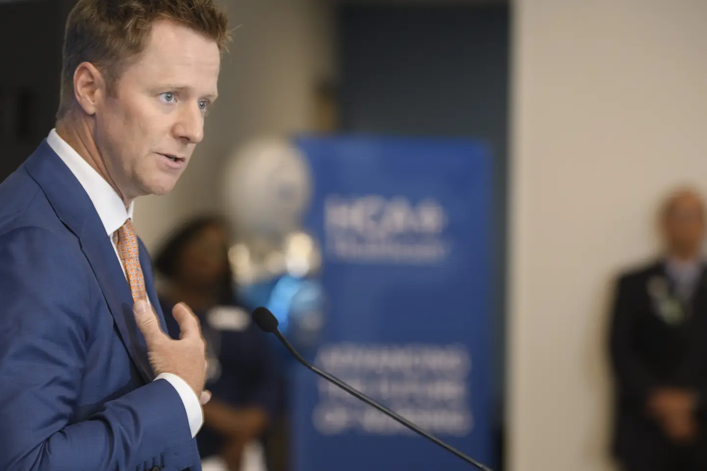 David Shimp, CEO, speaking at a microphone
