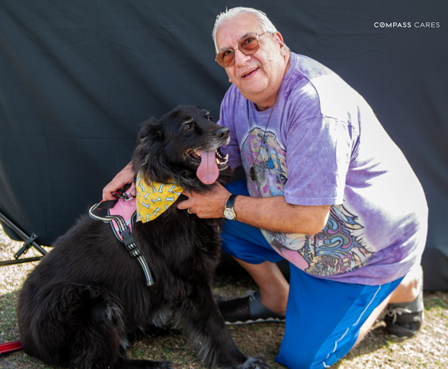 Dennis Fasono before weight loss surgery, posing with his dog