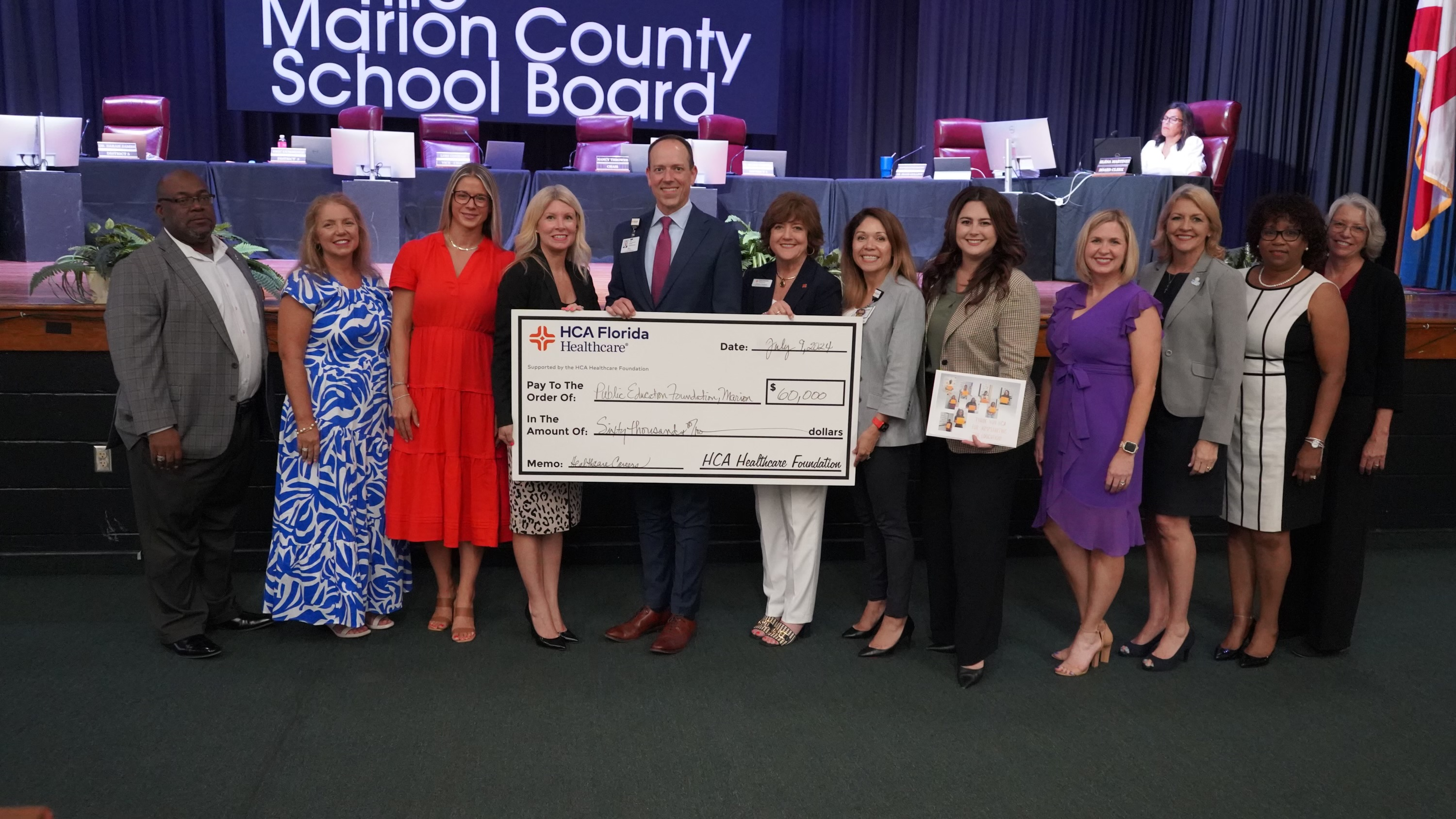 $60,000 check presented to Marion County School Board Public Education Foundation by Ocala and West Marion Hospital staff.