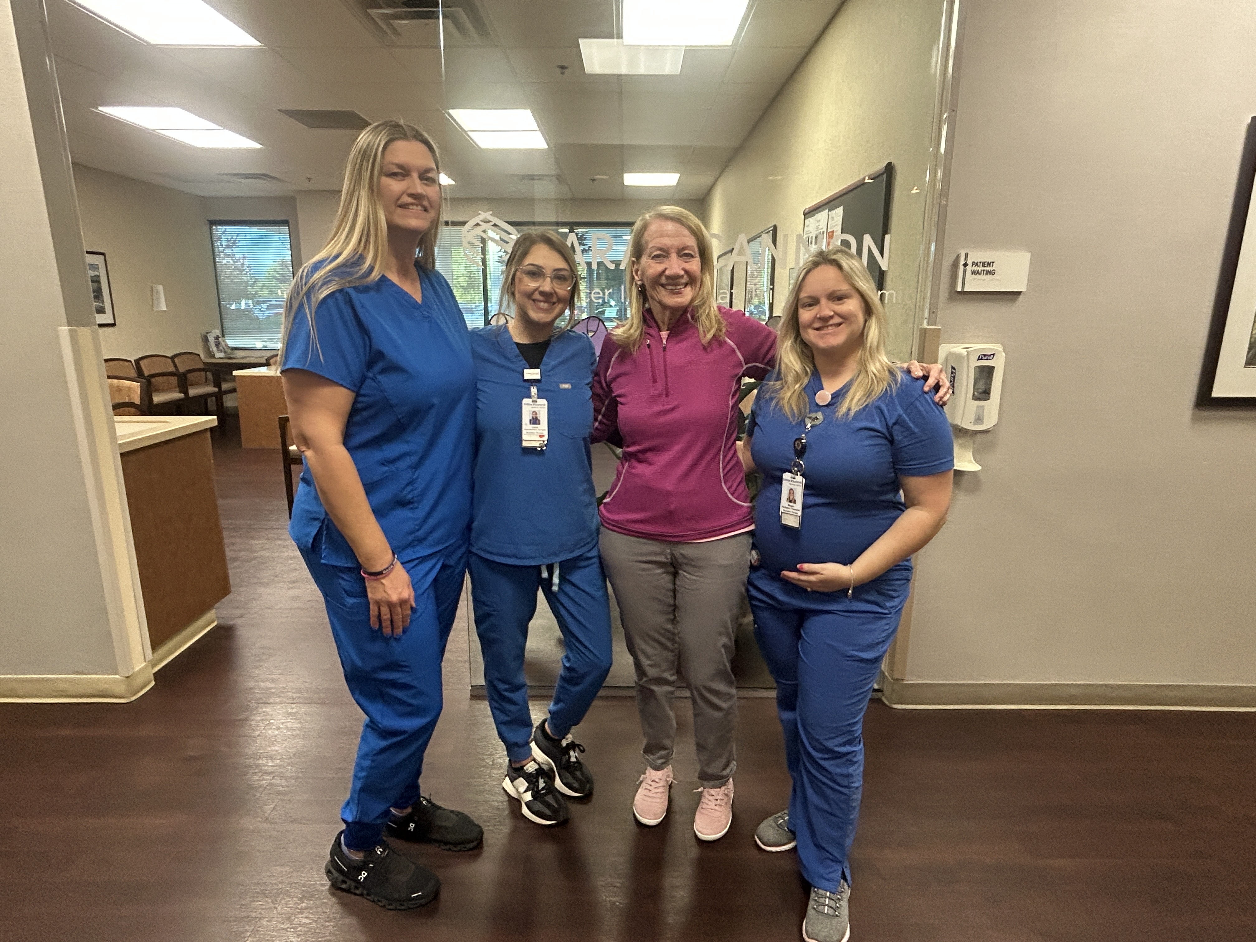 Michelle Molden celebrates with her care team.