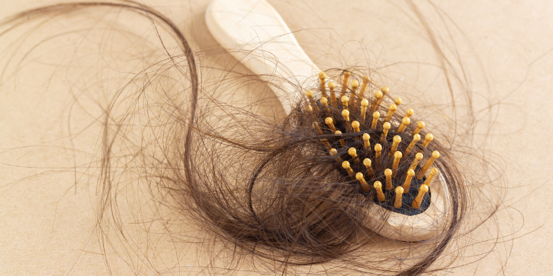 Hair stuck in a hairbrush.