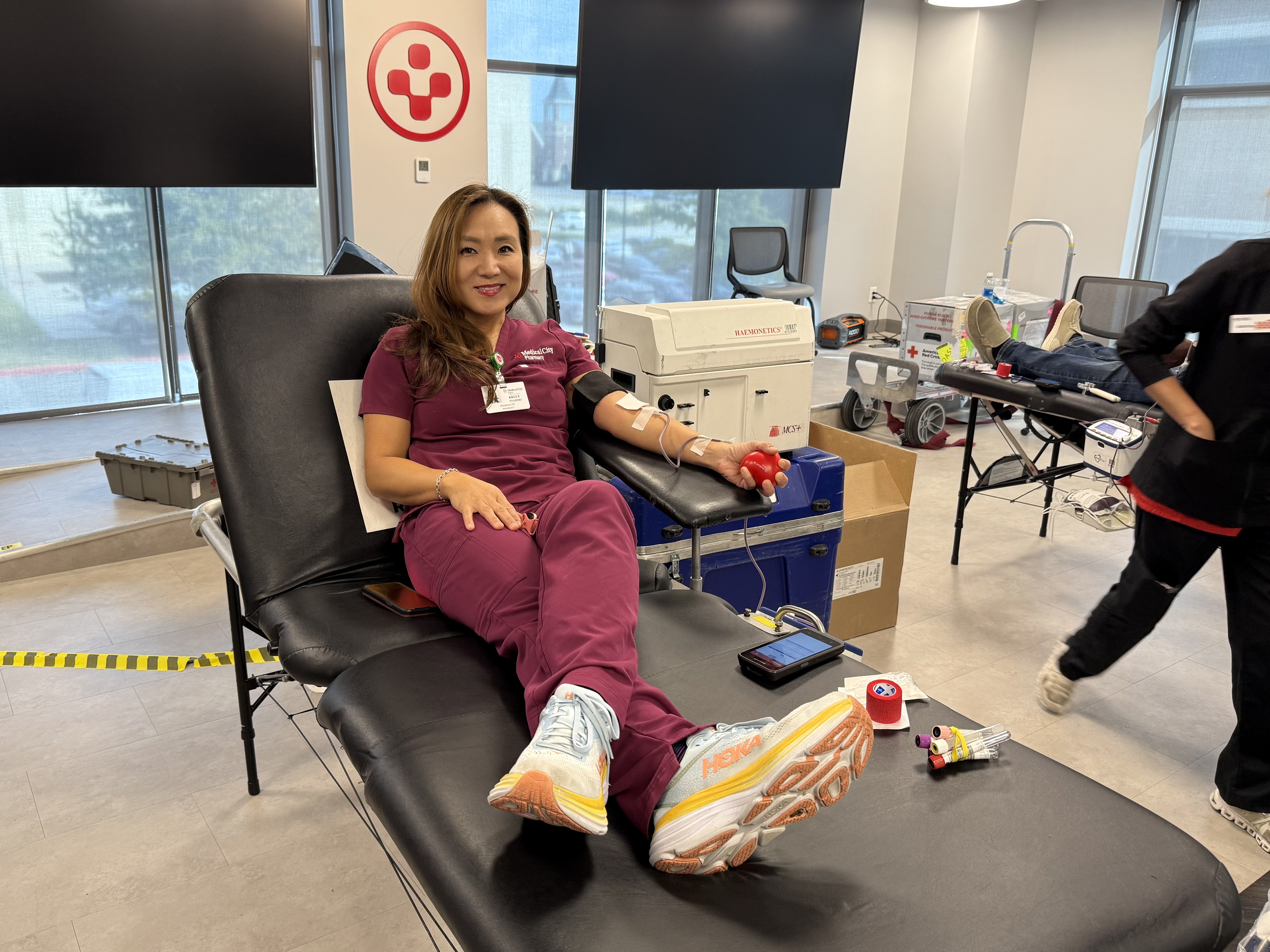 A woman donating blood.
