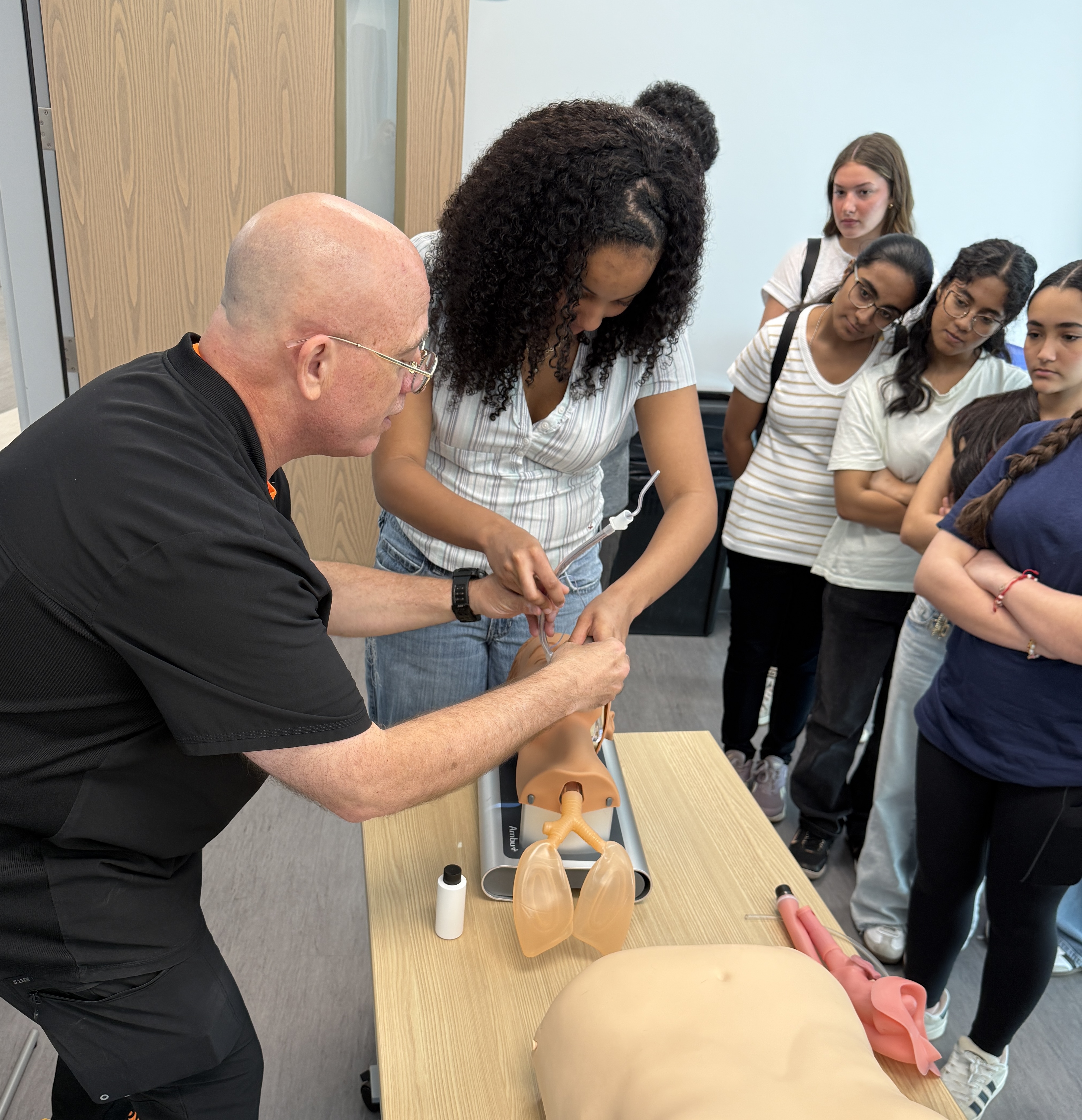 Mini medical demonstration with students and medical props