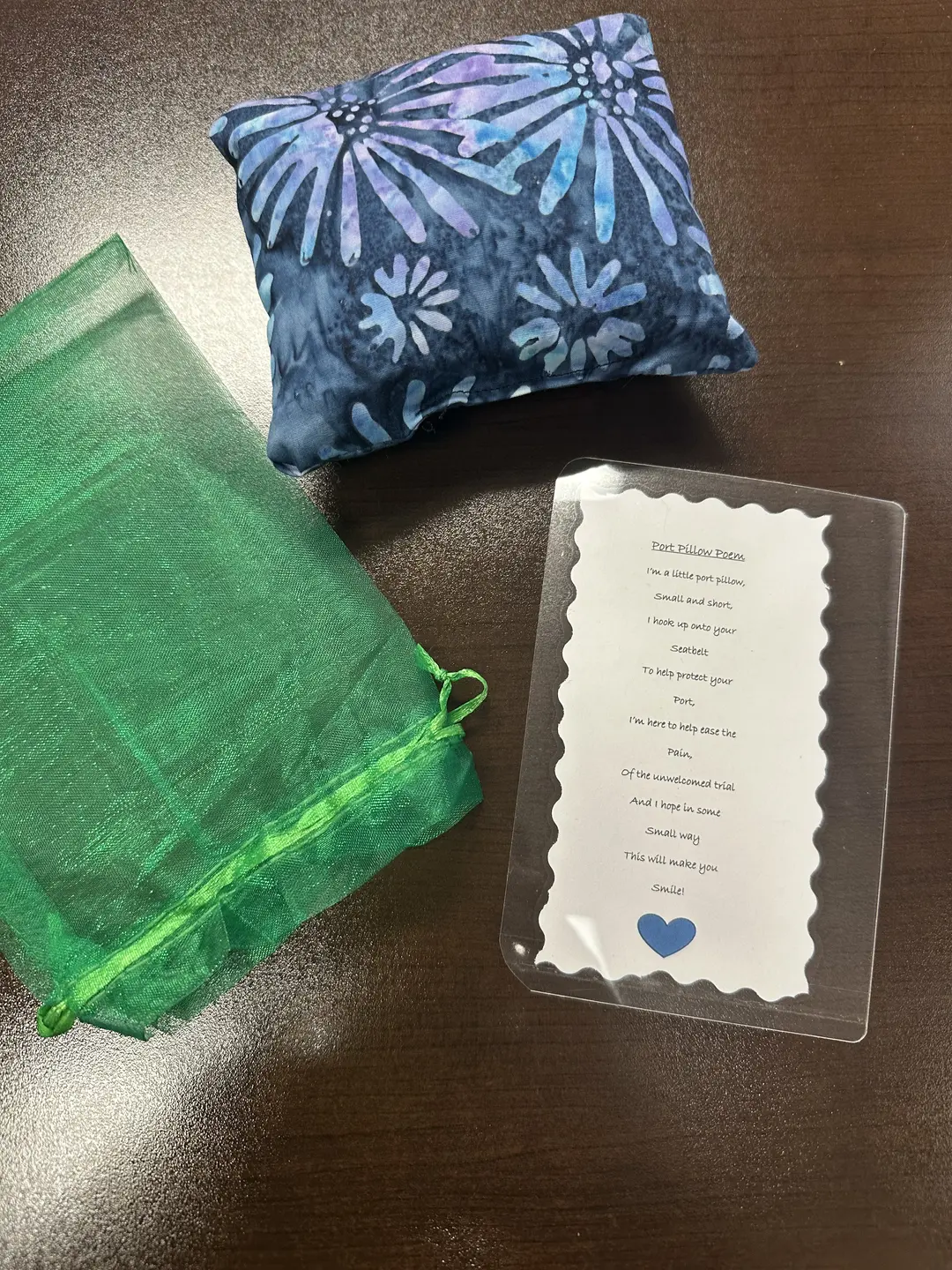 Handmade blue pillow and a note for the patient.