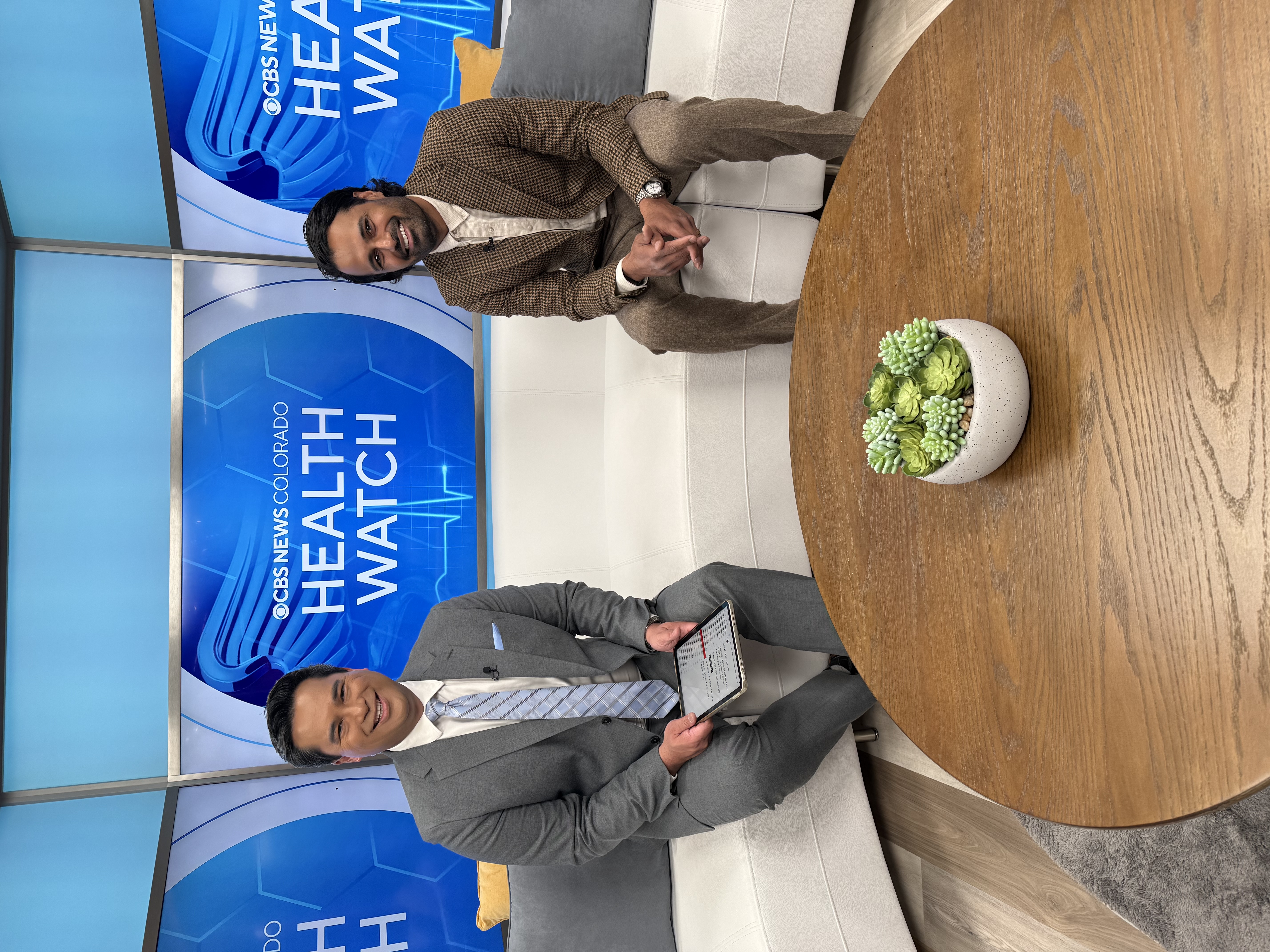 Dr. Akhil Reddy with host at CBS News Colorado