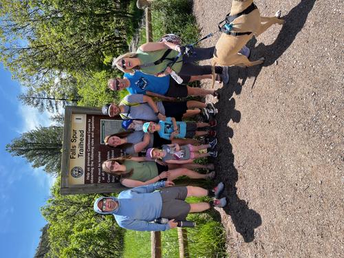 John Fulton and Family posing for a photo at the Falls Spur Trailhead.