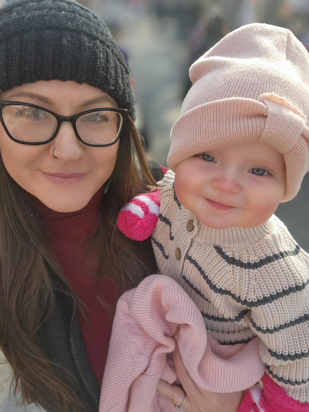 Winter selfie of Ashley Conte with infant daughter Charlotte