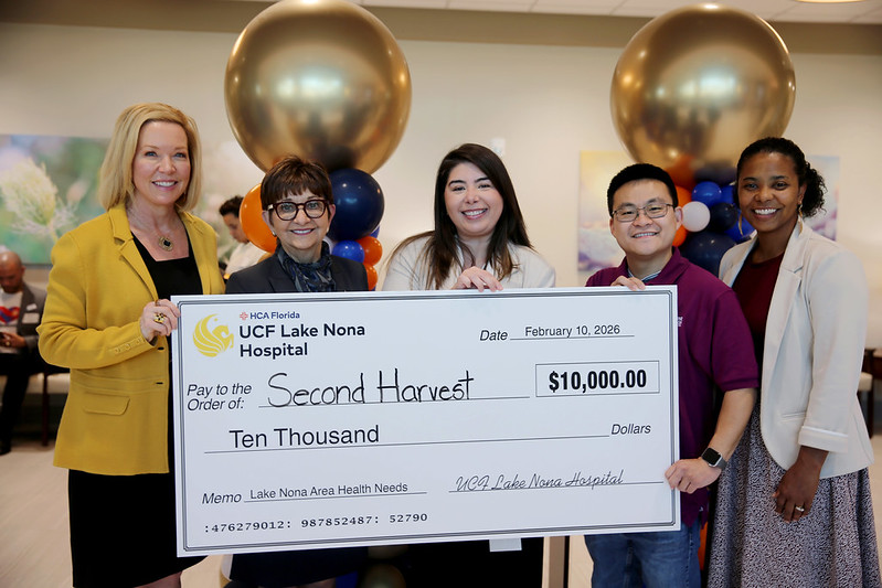 UCF Lake Nona Hospital celebrates the inaugural donation of ten thousand dollars for community harvest.