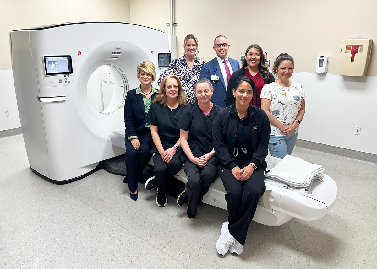 Suwannee Emergency imagine team poses with new CT scanner.