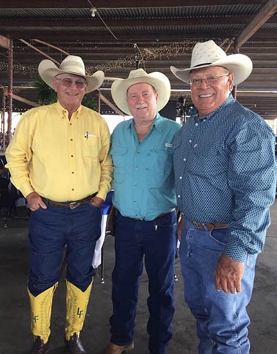Hilario (Larry) Garcia with the commissioner and a friend.