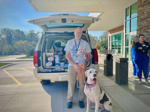 Dr. Jamie Loggins and his dog.