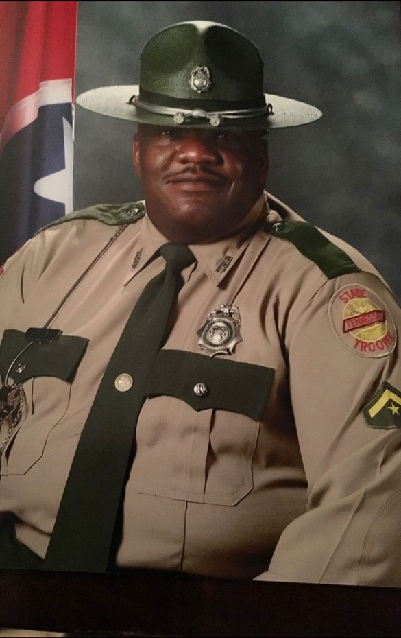 Vester Jones in his officers uniform for a professional headshot photo.