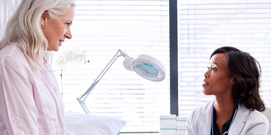 Female doctor consults with a patient