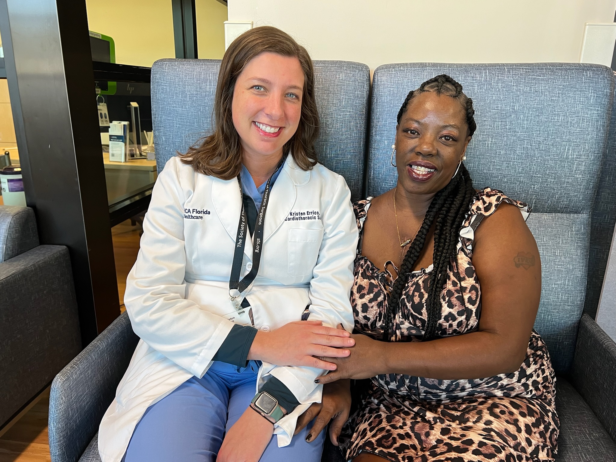 Debra Shine sits with Dr. Erricho and expresses her gratitude.